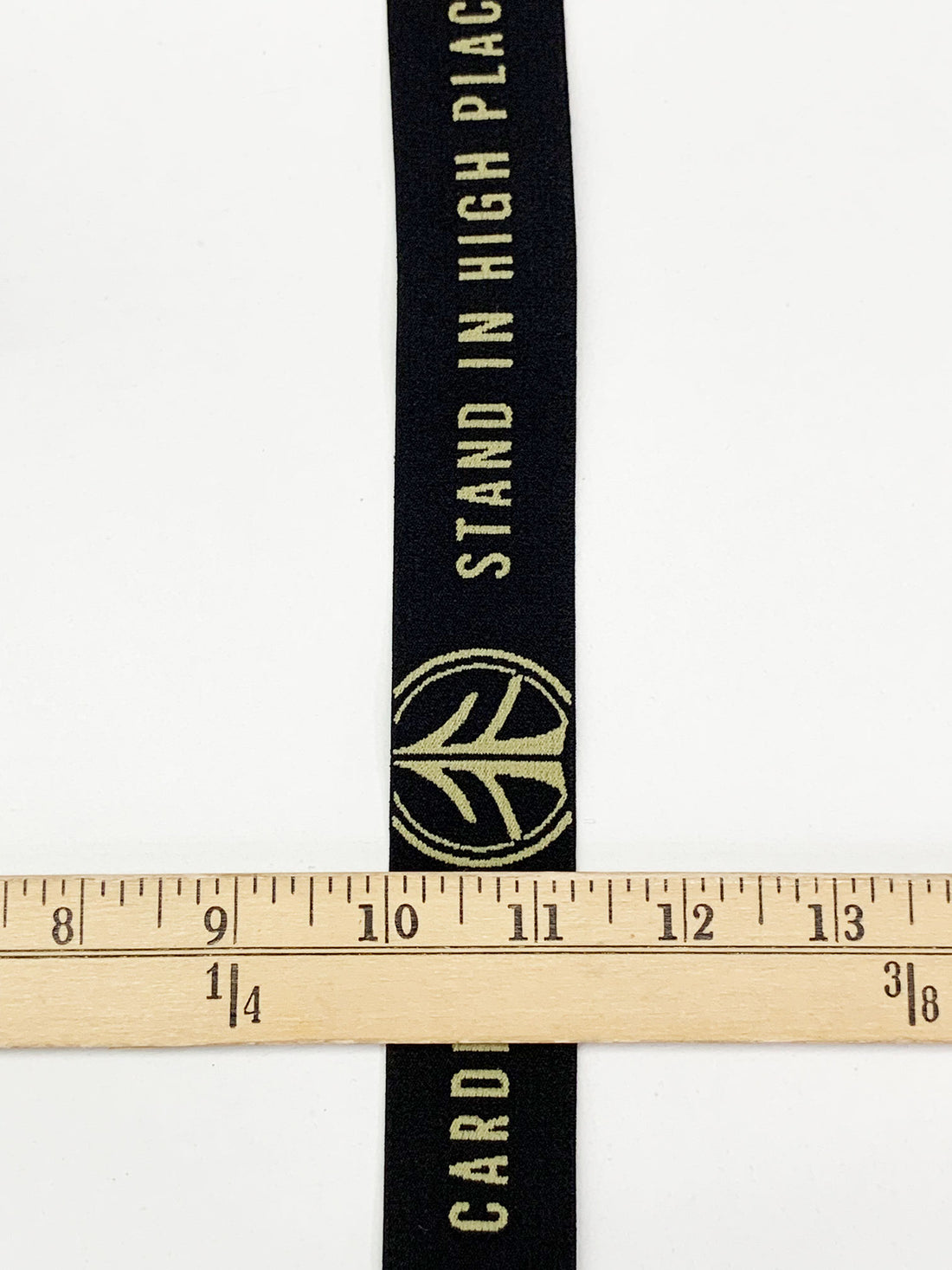 1 1/4" Black/Tan Branded Text Medallion Jacquard Elastic - Corbeaux Clothing - BY THE 5 YARD PIECE