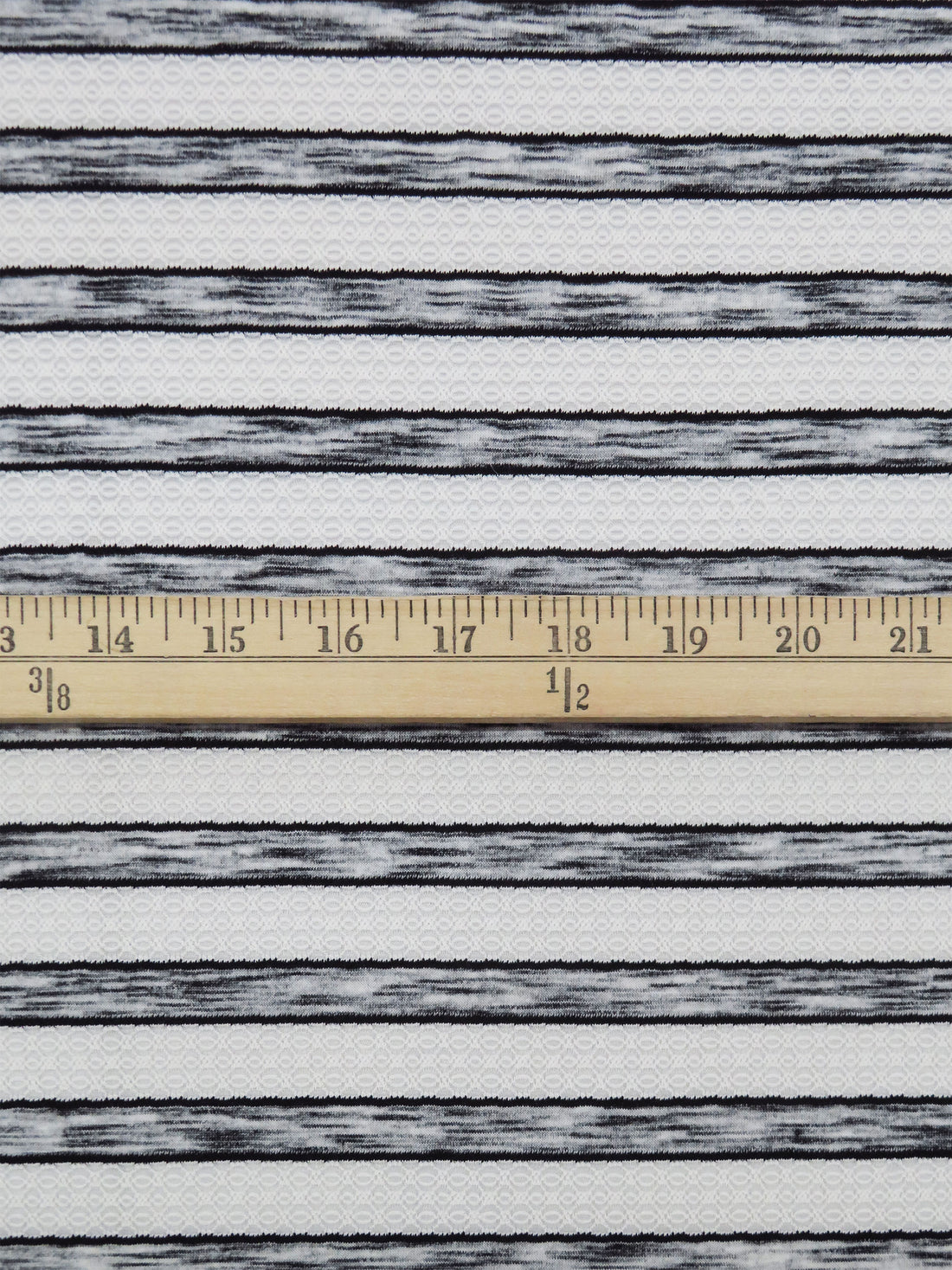 White/Heathered Black Polyester/Lycra Horizontal Multi Stripe Novelty Weave Knit 60W