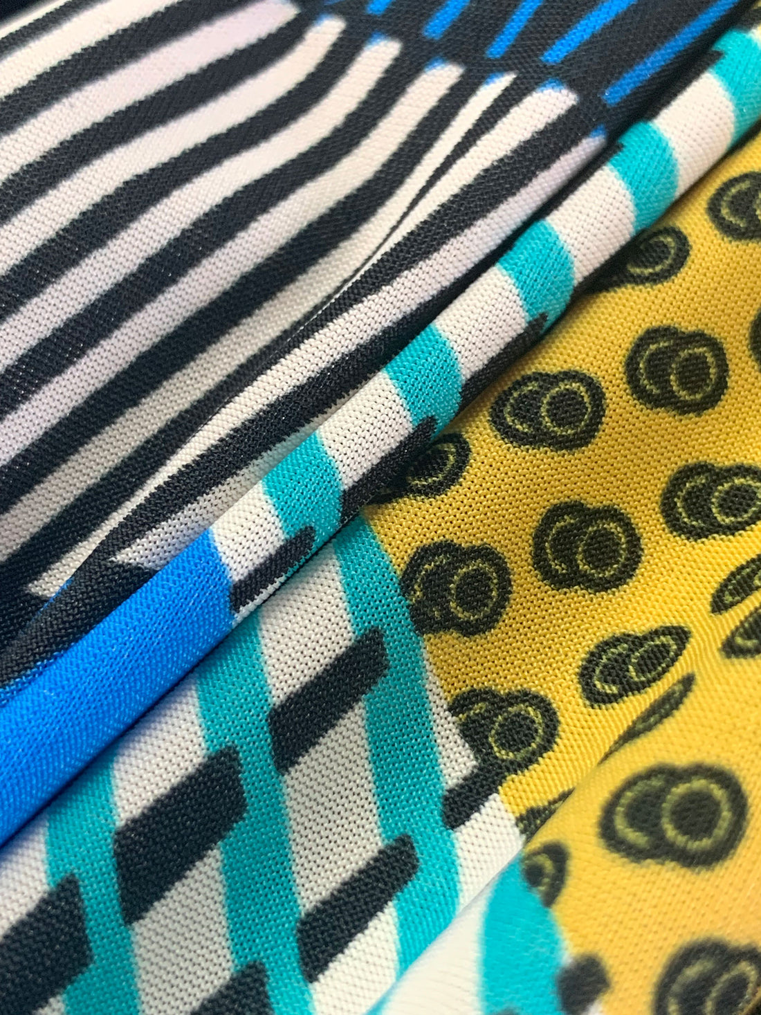 True Blue/Teal Green/Black/Multi Polyester/Lycra Abstract Multi Print FTY Knit 58W