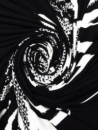 SOLD BY THE PANEL ONLY - Ink Black/Snow White Polyester/Lycra Large Abstract Leaf Print ITY Knit - NY Designer - 60W