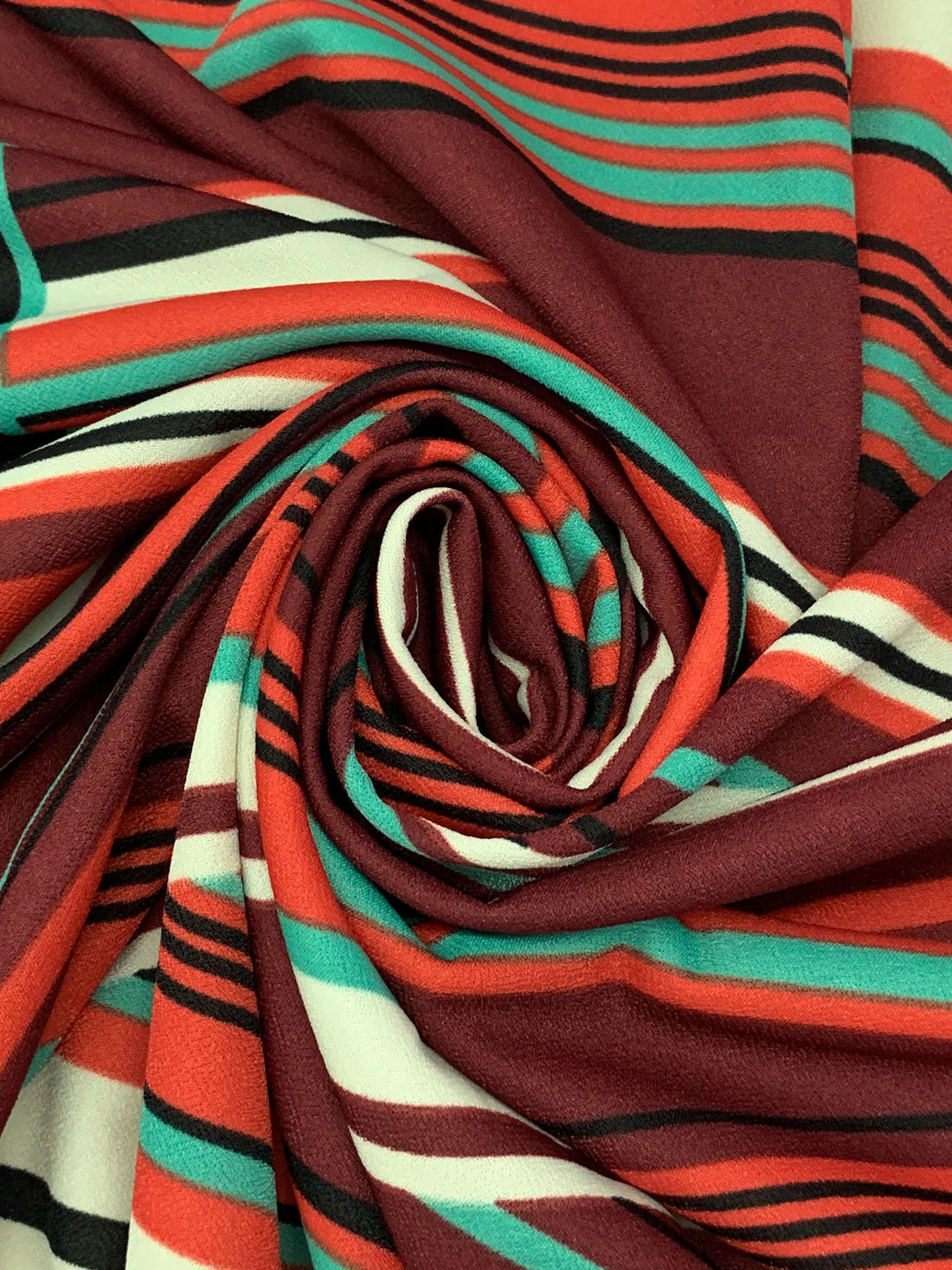 Muted Garnet/Medium Vermilion/Black/Multi 100% Polyester Large Overlapping Stripe Print Crepe Double Knit 56W