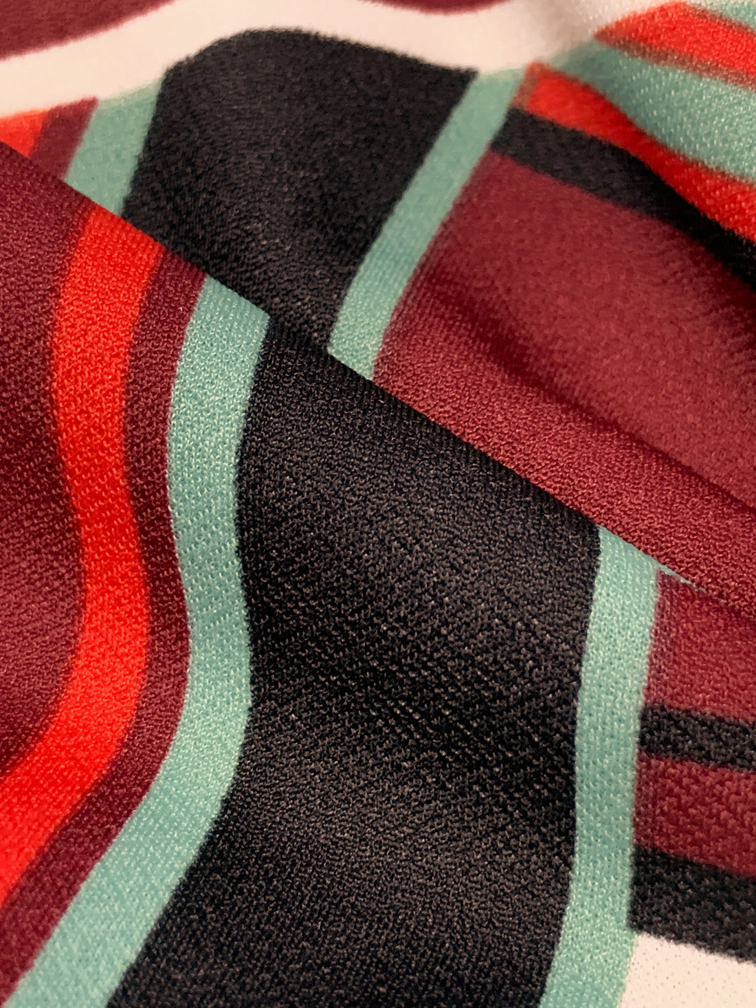 Muted Garnet/Medium Vermilion/Black/Multi 100% Polyester Large Overlapping Stripe Print Crepe Double Knit 56W