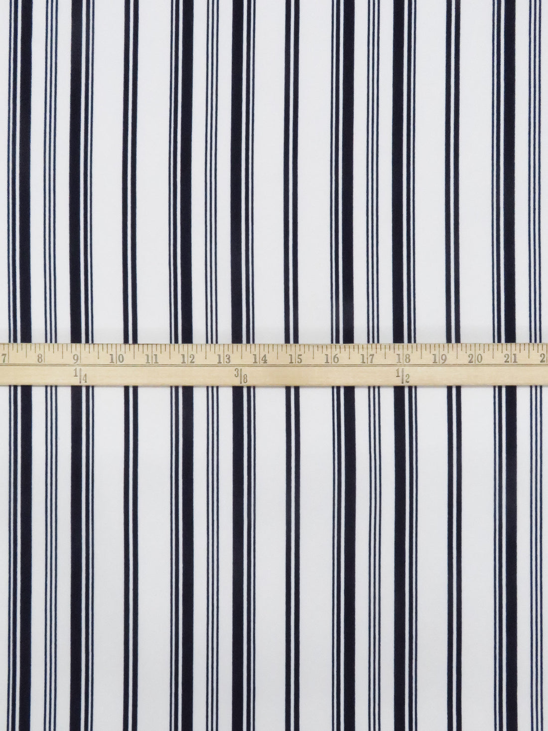 White/Muted Midnight Navy Polyester/Lycra Vertical Multi Stripe Print Crepe Double Knit 56W