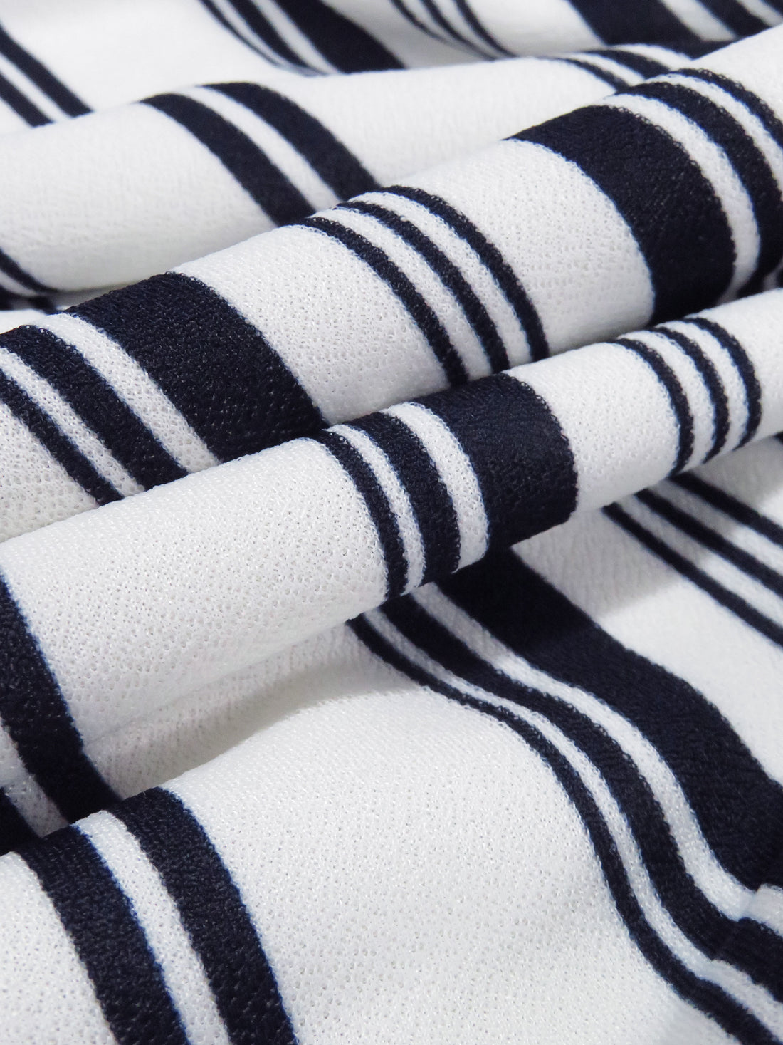 White/Muted Midnight Navy Polyester/Lycra Vertical Multi Stripe Print Crepe Double Knit 56W