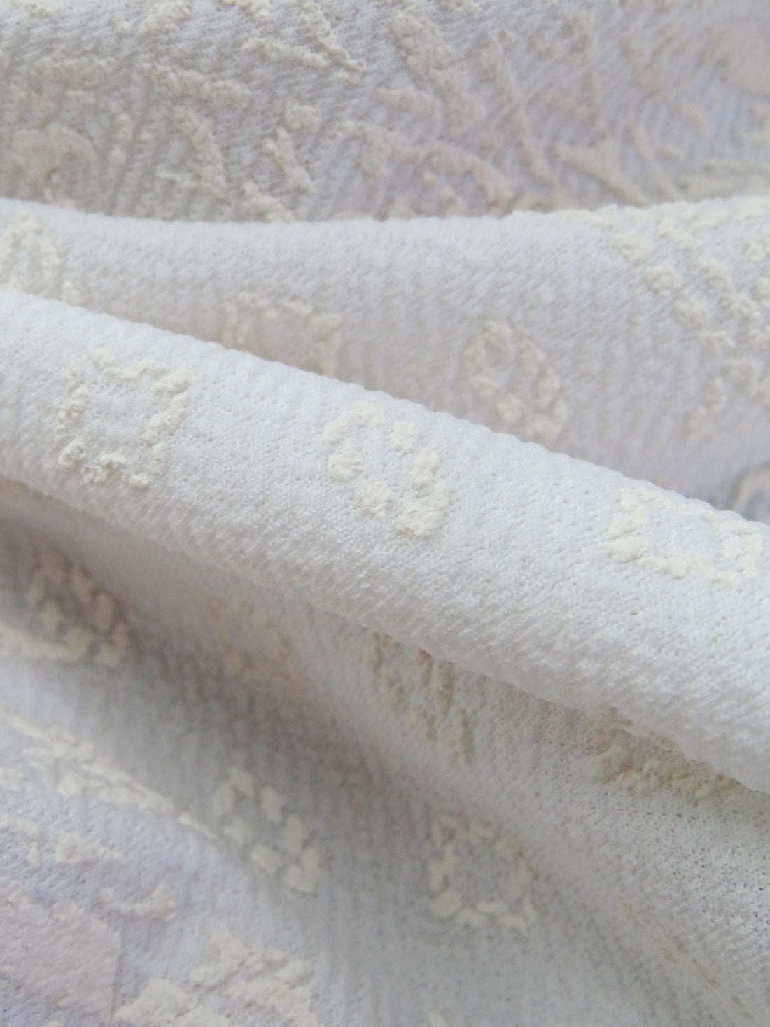 White/Off-White Polyester/Lycra Large Single Border Ornate Puff Print Liverpool Double Knit 58W