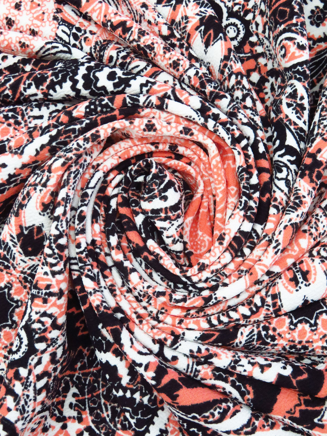 Black/Salmon/White Polyester/Lycra Everything Paisley Print Liverpool Double Knit 58W