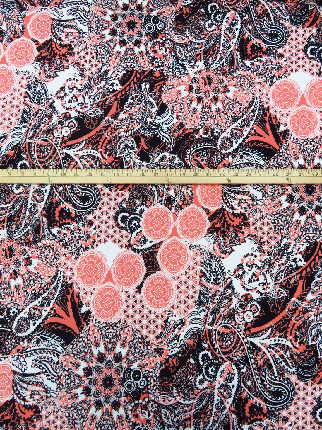 Black/Salmon/White Polyester/Lycra Everything Paisley Print Liverpool Double Knit 58W
