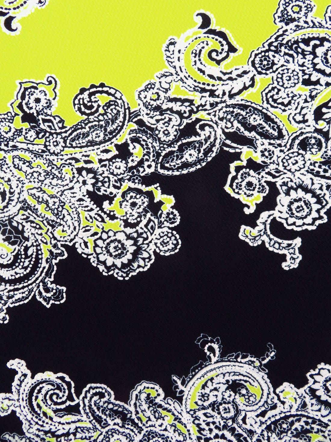 Black/White/Bitter Lemon Polyester/Lycra Diagonal Floral Paisley Puff Print Liverpool Double Knit 56W
