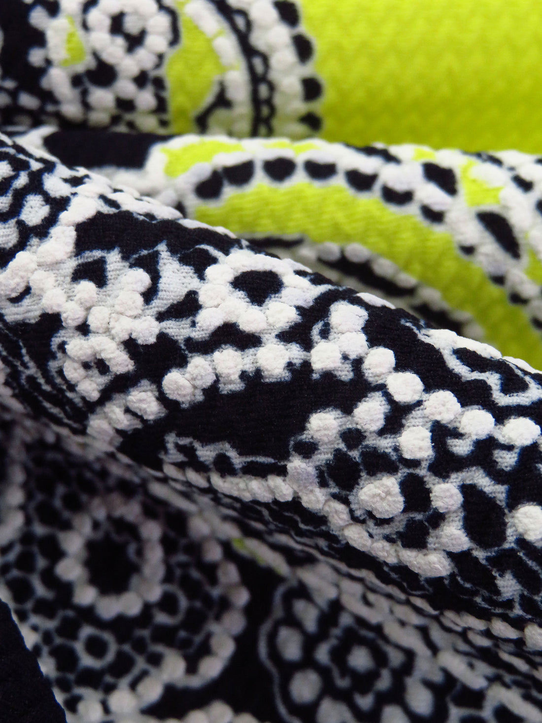 Black/White/Bitter Lemon Polyester/Lycra Diagonal Floral Paisley Puff Print Liverpool Double Knit 56W