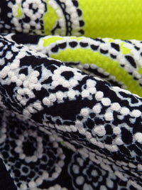 Black/White/Bitter Lemon Polyester/Lycra Diagonal Floral Paisley Puff Print Liverpool Double Knit 56W