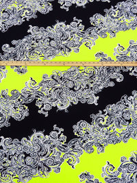 Black/White/Bitter Lemon Polyester/Lycra Diagonal Floral Paisley Puff Print Liverpool Double Knit 56W