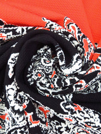 Black/White/Poppy Polyester/Lycra Diagonal Floral Paisley Puff Print Liverpool Double Knit 56W