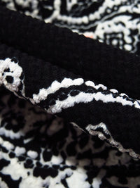 Black/White/Poppy Polyester/Lycra Diagonal Floral Paisley Puff Print Liverpool Double Knit 56W