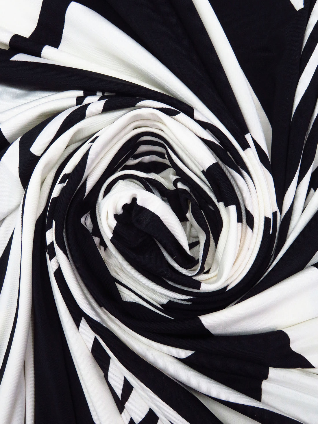 Warm White/Black Polyester/Lycra Abstract Print FTY Knit 58W