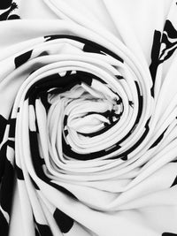 Snow White/Pitch Black Polyester/Lycra Silhouette Floral Print ITY Knit 60W