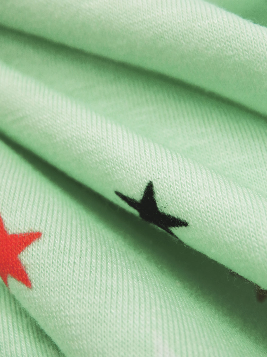 Celadon/Scarlet/Black/Multi Rayon/Lycra Stars Print Jersey Knit 60W