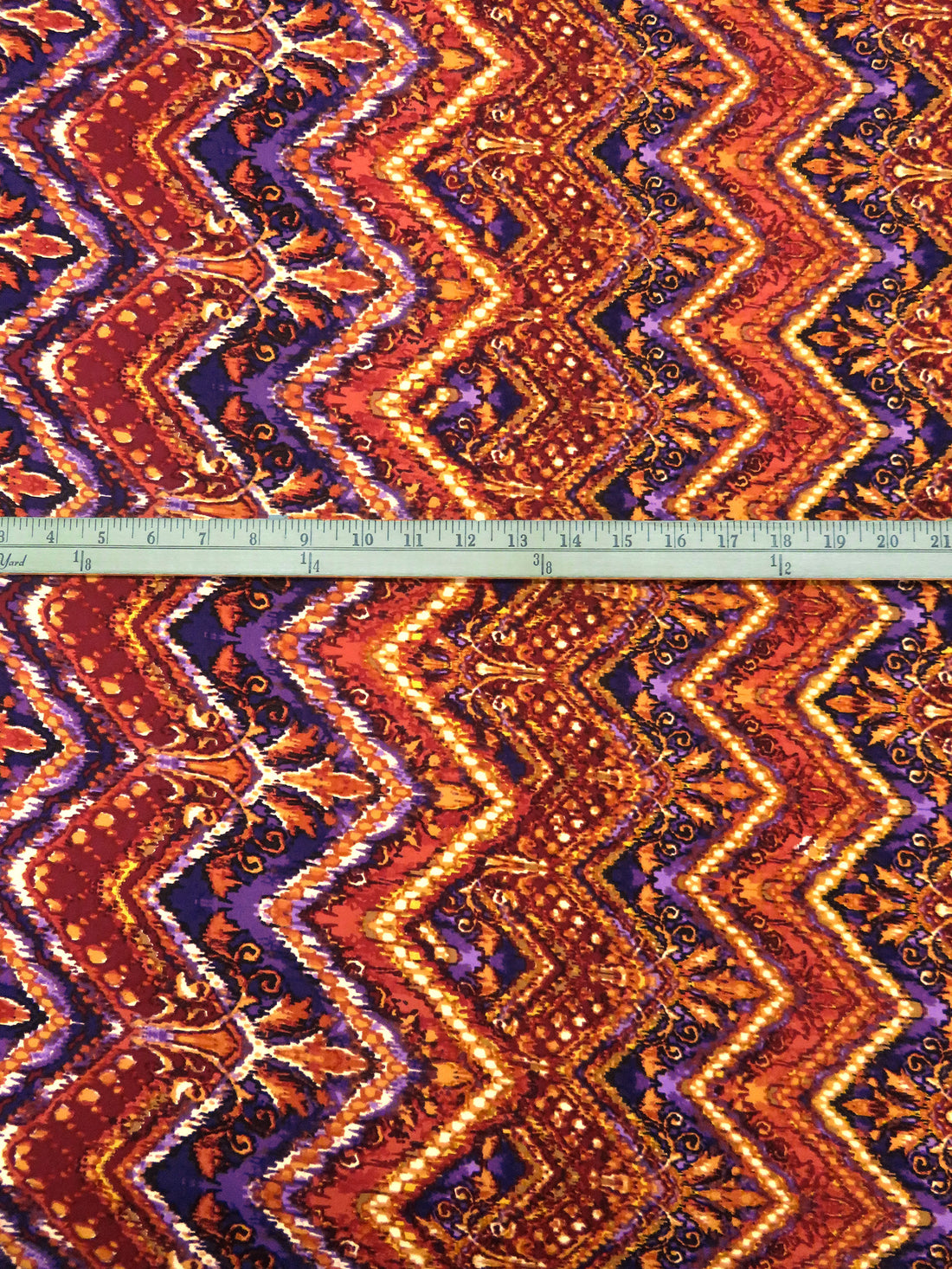 Tangerine/Royal Purple/Maroon/Multi Polyester/Lycra Double Border Vertical Ornate Chevron Print DTY Knit 58W