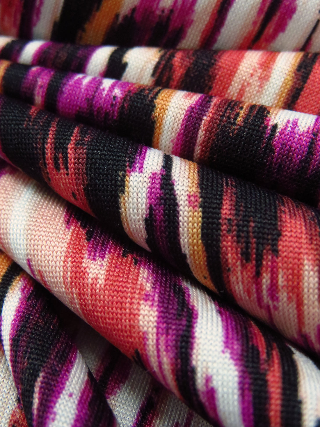 Black/Jazzberry Jam/Coral/Multi Polyester/Lycra Abstract Print DTY Knit 58W