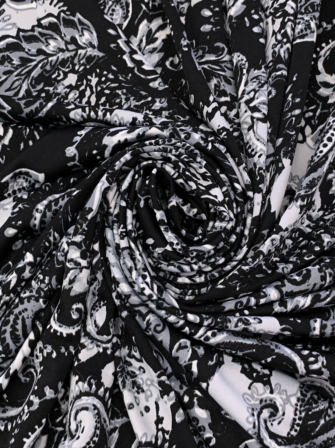 Bright Silver/Black/Aluminum Polyester/Lycra Stylized Floral Scrolls Print DTY Knit 59W