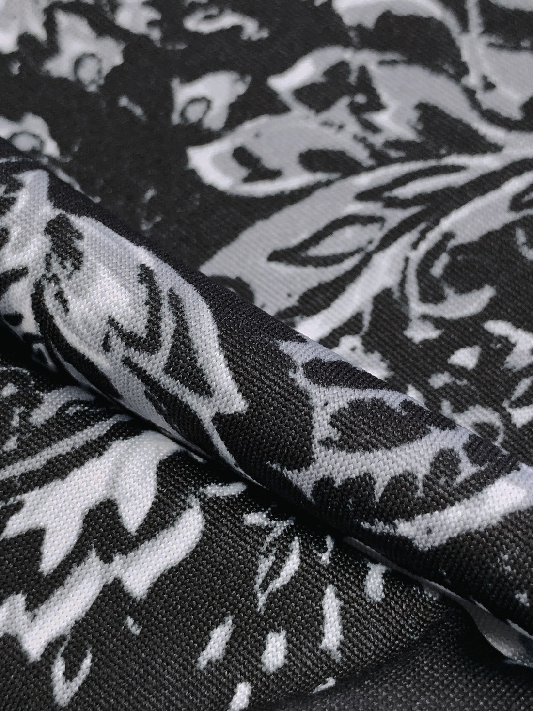 Bright Silver/Black/Aluminum Polyester/Lycra Stylized Floral Scrolls Print DTY Knit 59W