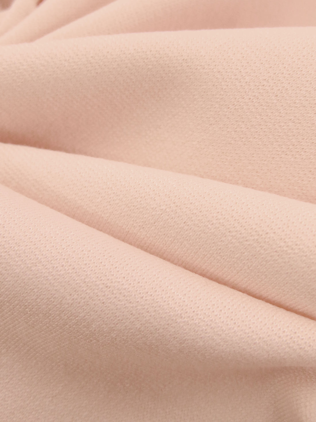 Coral Bisque Pink Rayon/Nylon/Spandex Ponte Knit 57W