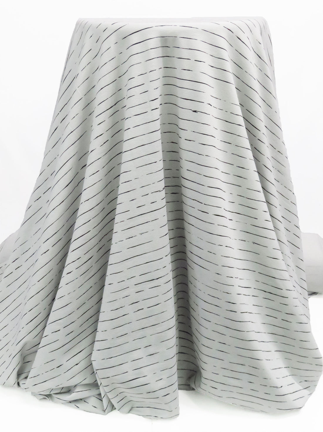 Silvery Gray/Black Rayon/Lycra Horizontal Broken Stripe Print Jersey Knit 60W