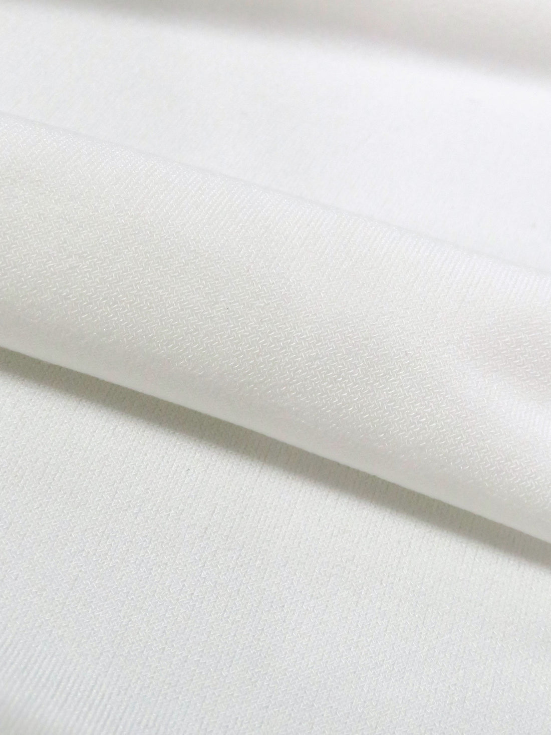 Daisy White Polyester/Lycra ITY Knit - NY Designer - 56W