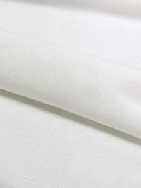 Daisy White Polyester/Lycra ITY Knit - NY Designer - 56W