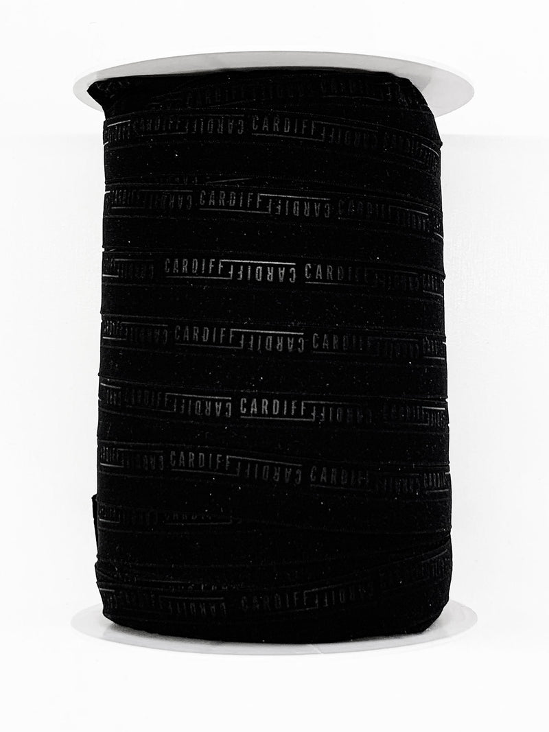 SOLD BY THE SPOOL - 3/4" Black Branded Text Fold-Over Elastic - Corbeaux Clothing