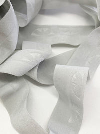 10 Yard Soft Gray Branded Medallion Fold-Over Elastic