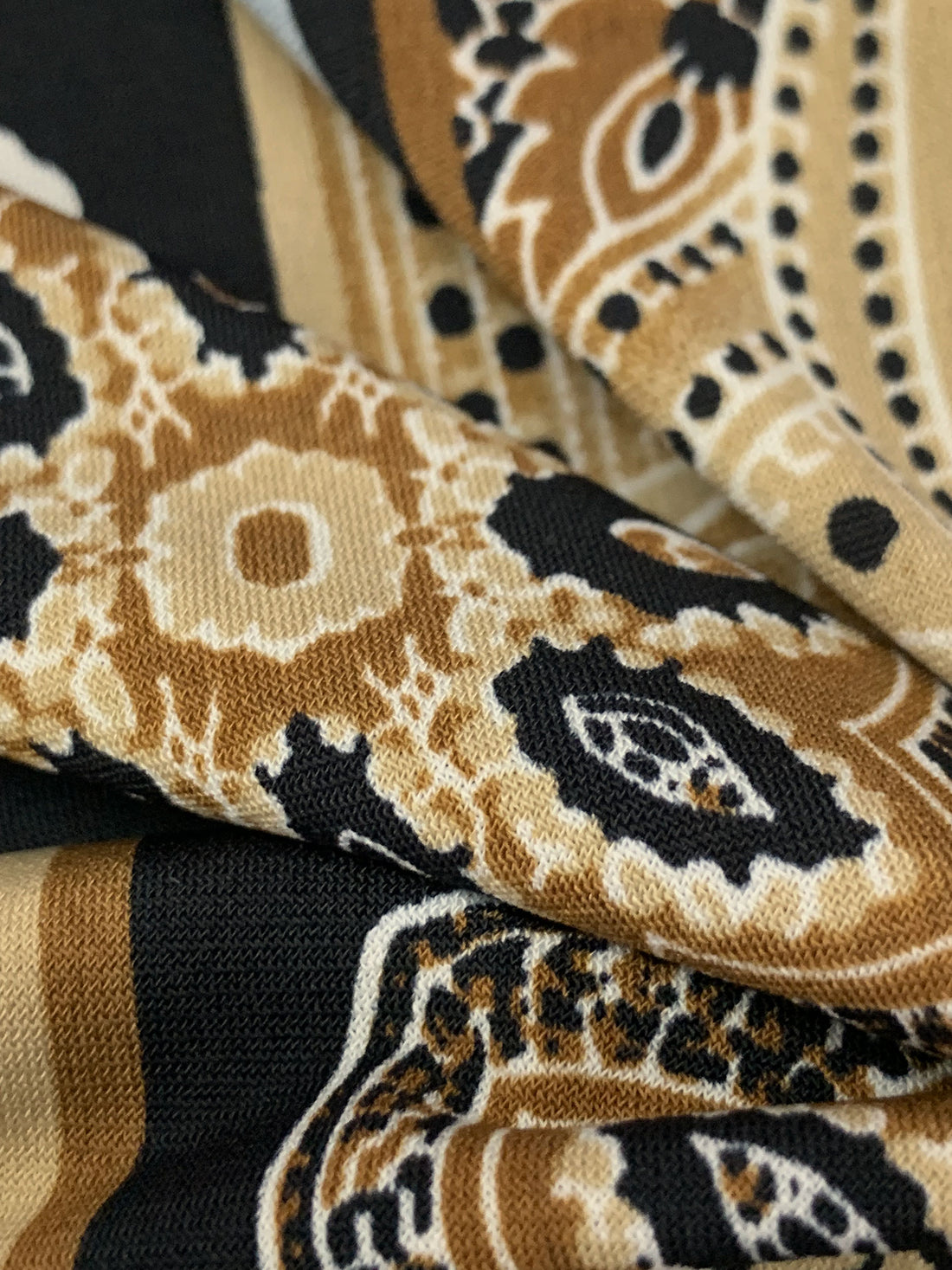 Bronze/Tan/Black/Pewter Blue Polyester/Lycra Double Border Stylized Scrolls Print ITY Knit 60W