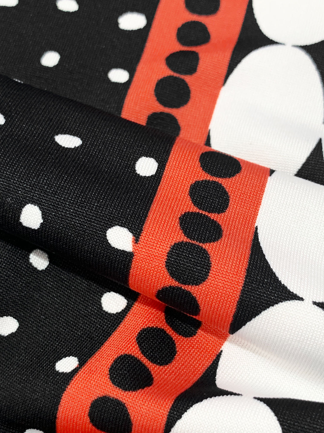 Burning Tomato/Black/White Polyester/Lycra Large Mirrored Vertical Multi-Dot Stripe Print DTY Knit 60W