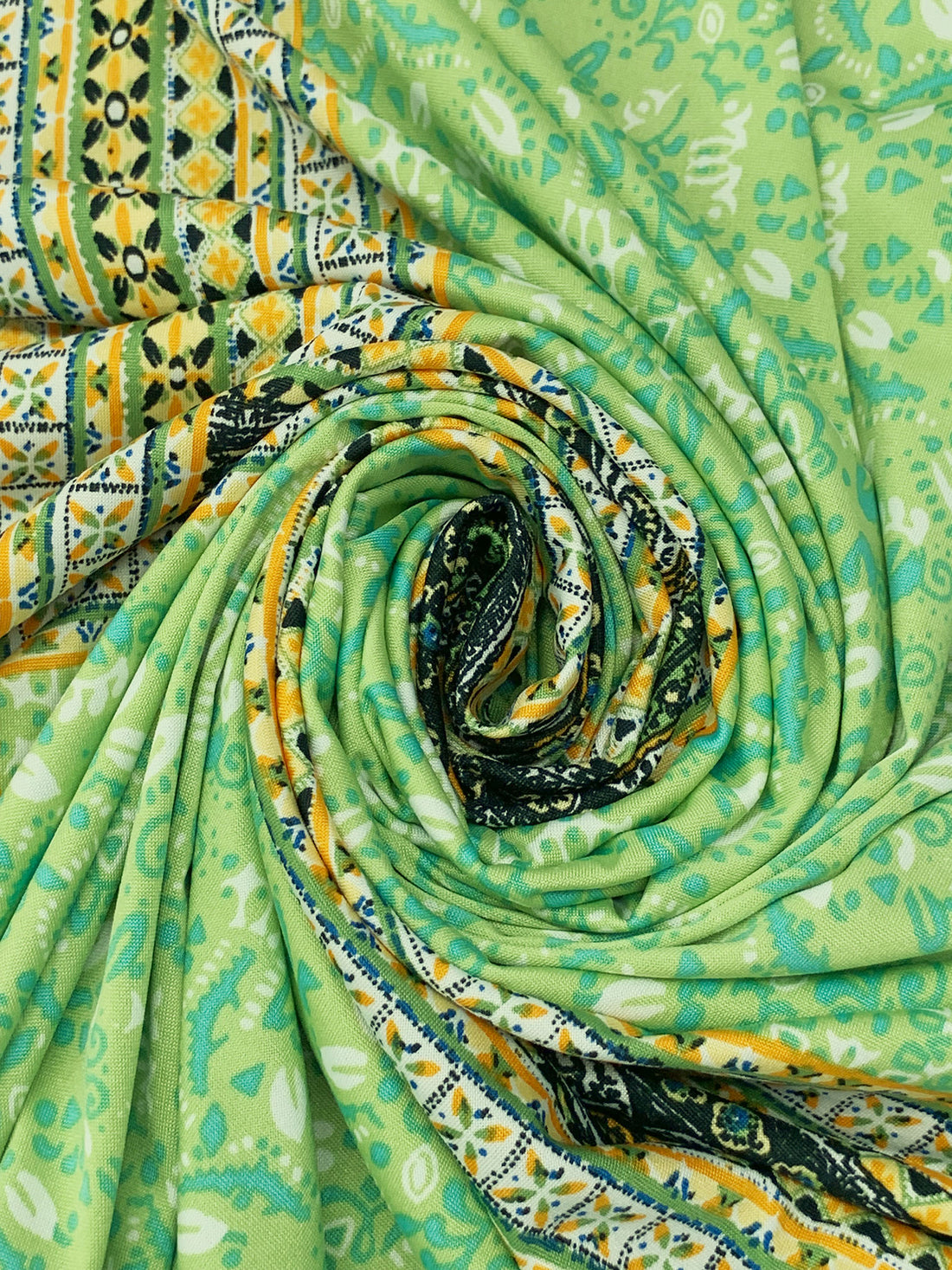 Stem Green/Turquoise/Off-White/Goldenrod Polyester/Lycra Double Border Abstract Framework Print DTY Knit 60W