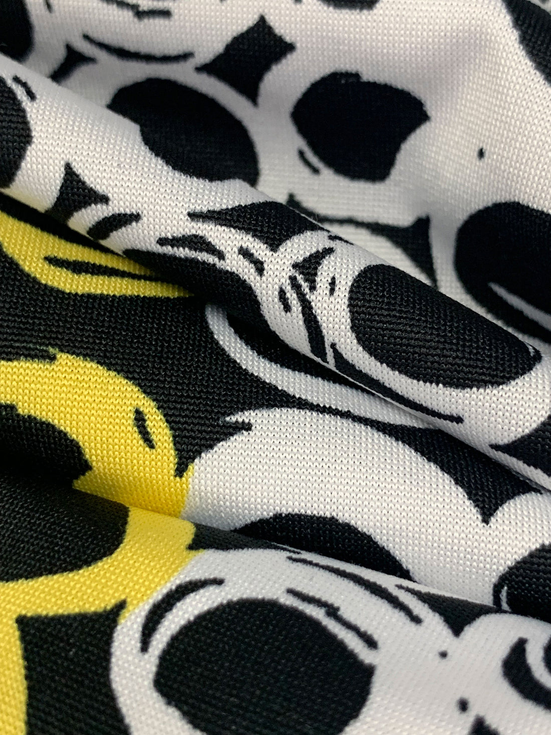 Black/White/Straw Polyester/Lycra Double Border Rugged Circles Print DTY Knit 58W