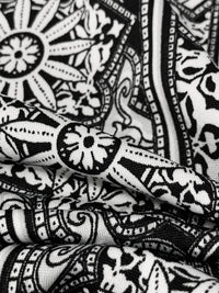 White/Black Polyester/Lycra Stylized Double Border Medallion Print DTY Knit 62W