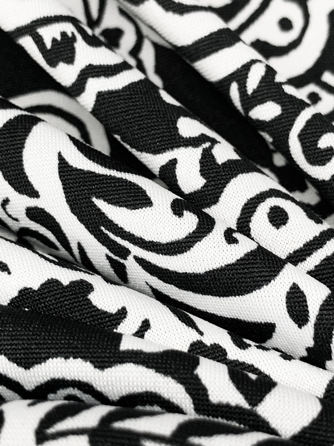 White/Black Polyester/Lycra Floral Paisley Print DTY Knit 61W