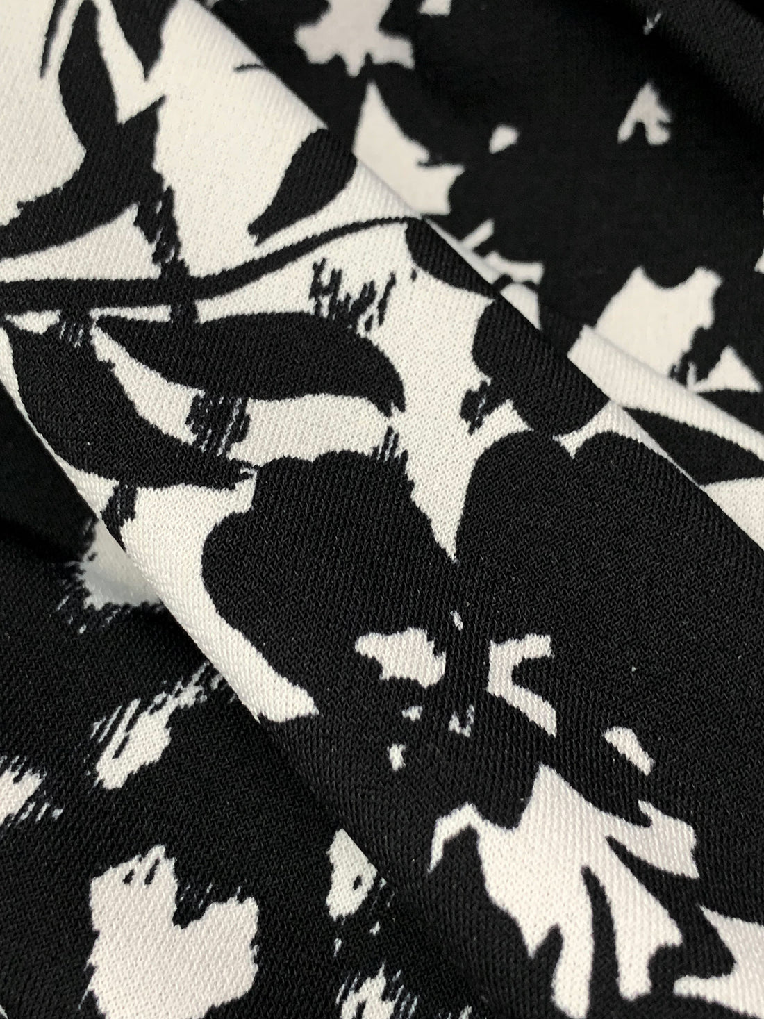 Black/Off-White Polyester/Lycra Horizontal Geometric Silhouette Floral Print ITY Knit 61W