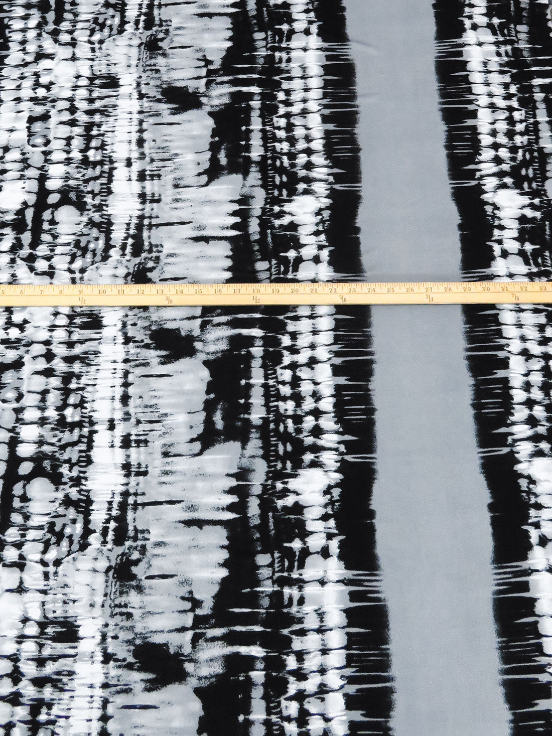 White/Mid Gray/Black Polyester/Lycra Mirrored Tie-Dye Look Vertical Stripe Print DTY Knit 60W