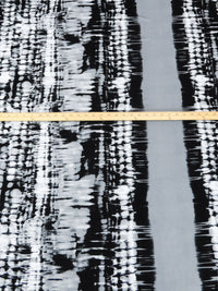 White/Mid Gray/Black Polyester/Lycra Mirrored Tie-Dye Look Vertical Stripe Print DTY Knit 60W