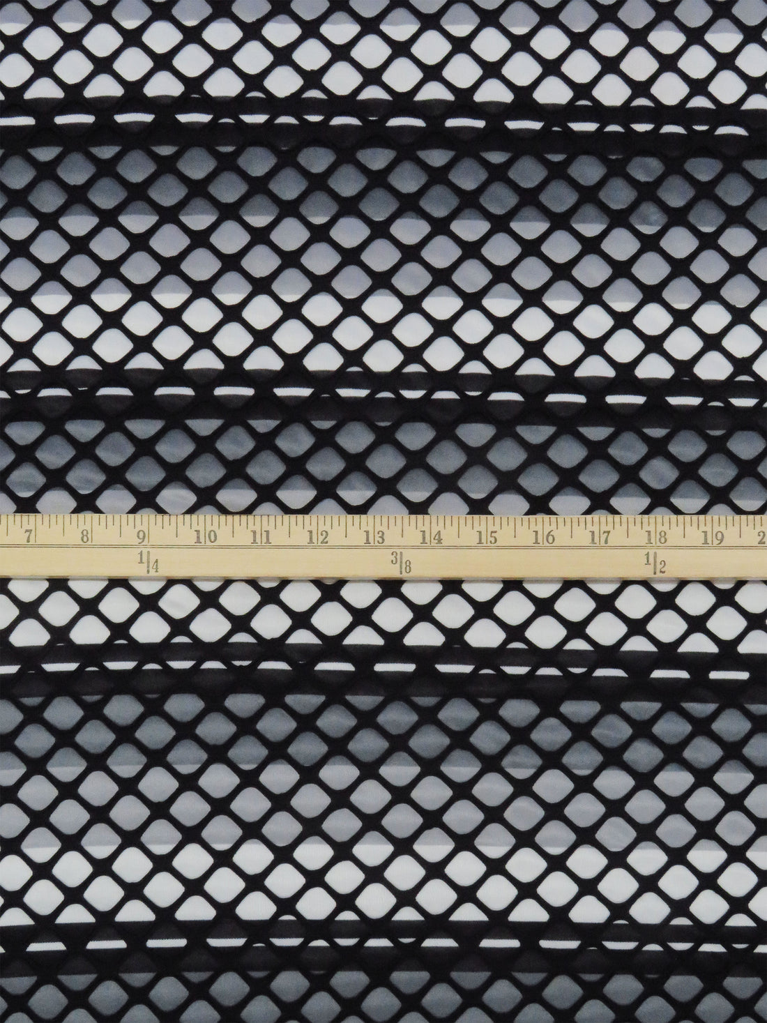 Black/Iron Gray/Cloud Gray/Pale Gray Polyester/Lycra Large Eyelet Over Horizontal Stripe Print Novelty Knit 54W