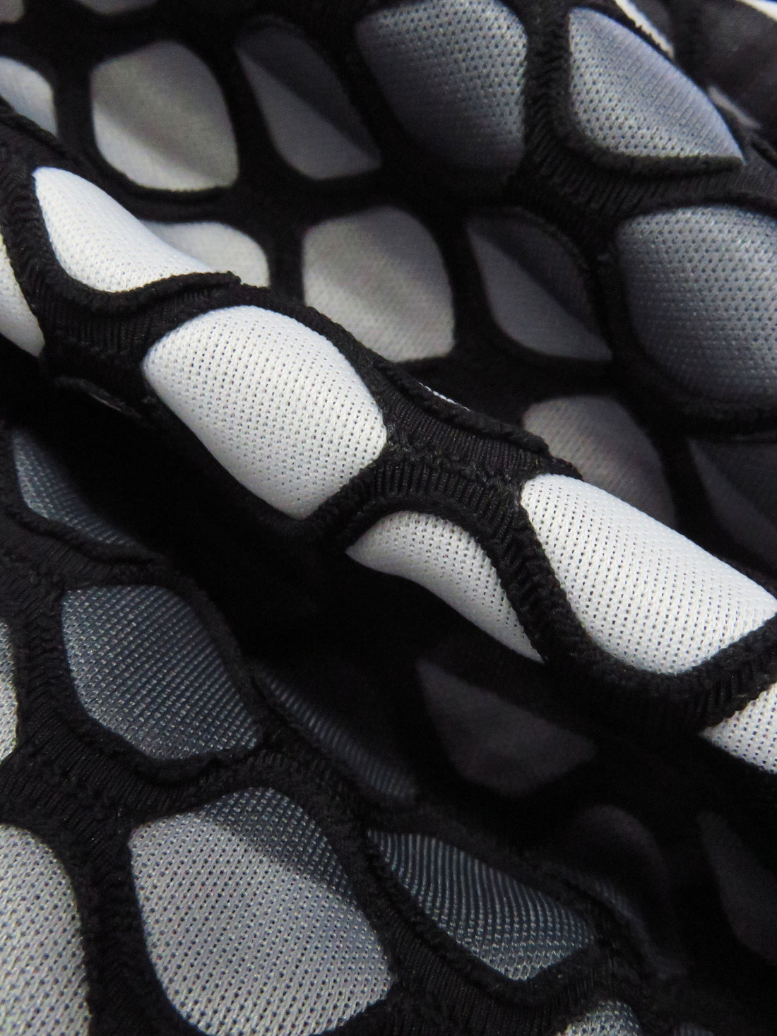 Black/Iron Gray/Cloud Gray/Pale Gray Polyester/Lycra Large Eyelet Over Horizontal Stripe Print Novelty Knit 54W