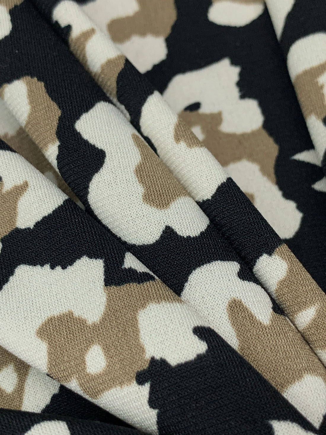 Black/Raw Umber/Antique Off-White Polyester/Lycra Animal-Look Abstract Print ITY Knit 60W