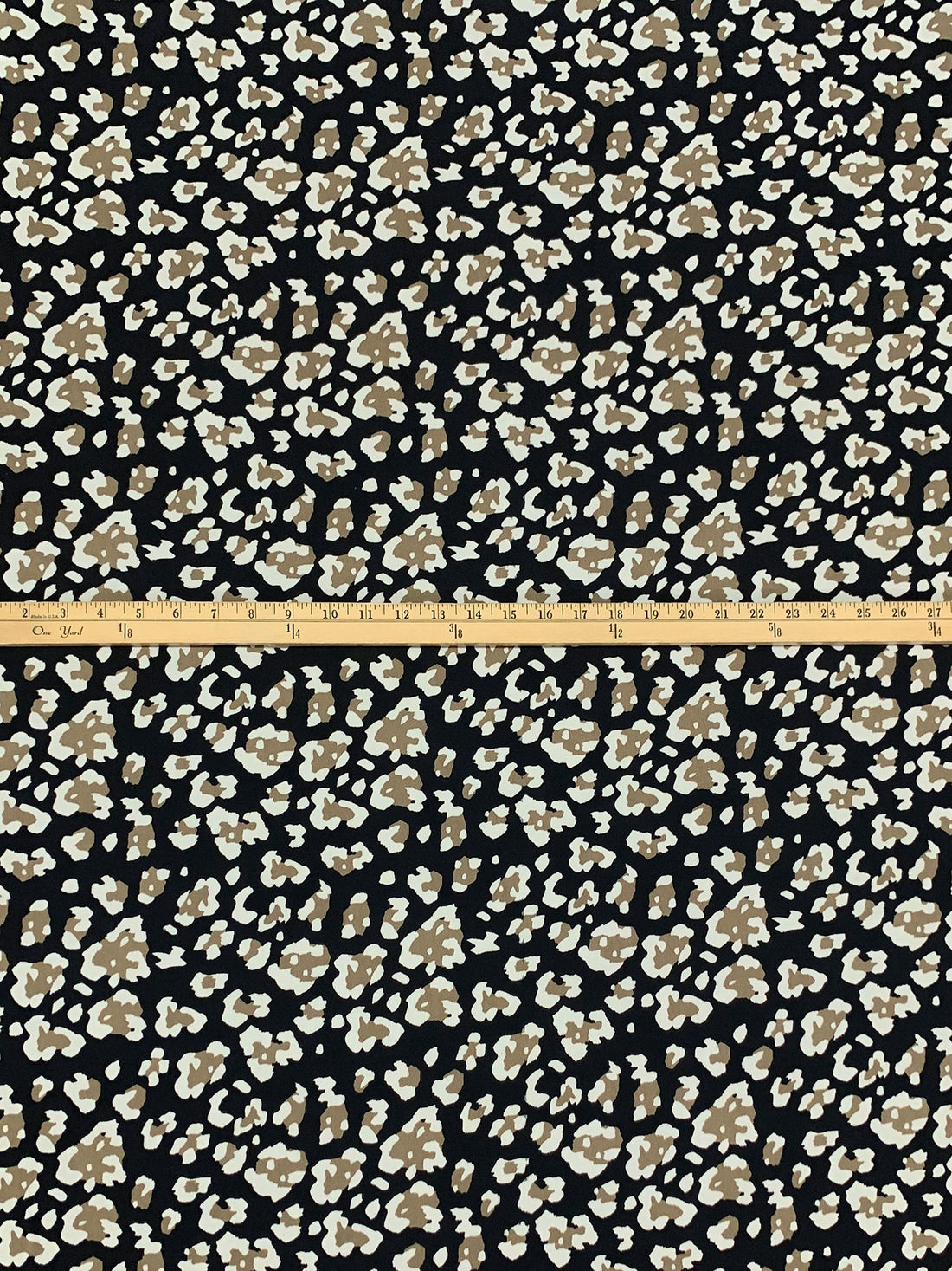 Black/Raw Umber/Antique Off-White Polyester/Lycra Animal-Look Abstract Print ITY Knit 60W