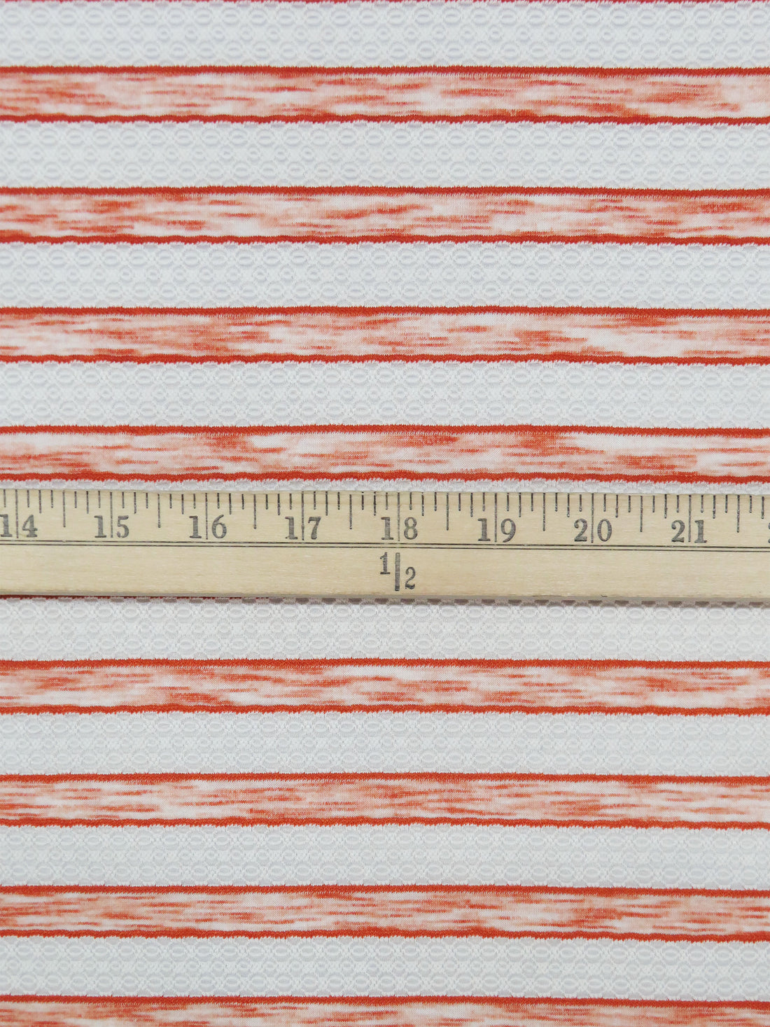 White/Heathered Flame Orange Polyester/Lycra Horizontal Multi Stripe Novelty Weave Knit 62W