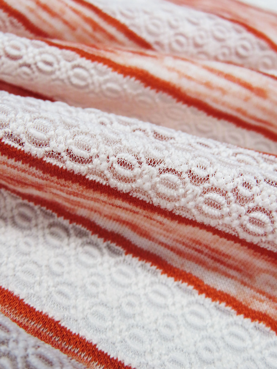 White/Heathered Flame Orange Polyester/Lycra Horizontal Multi Stripe Novelty Weave Knit 62W