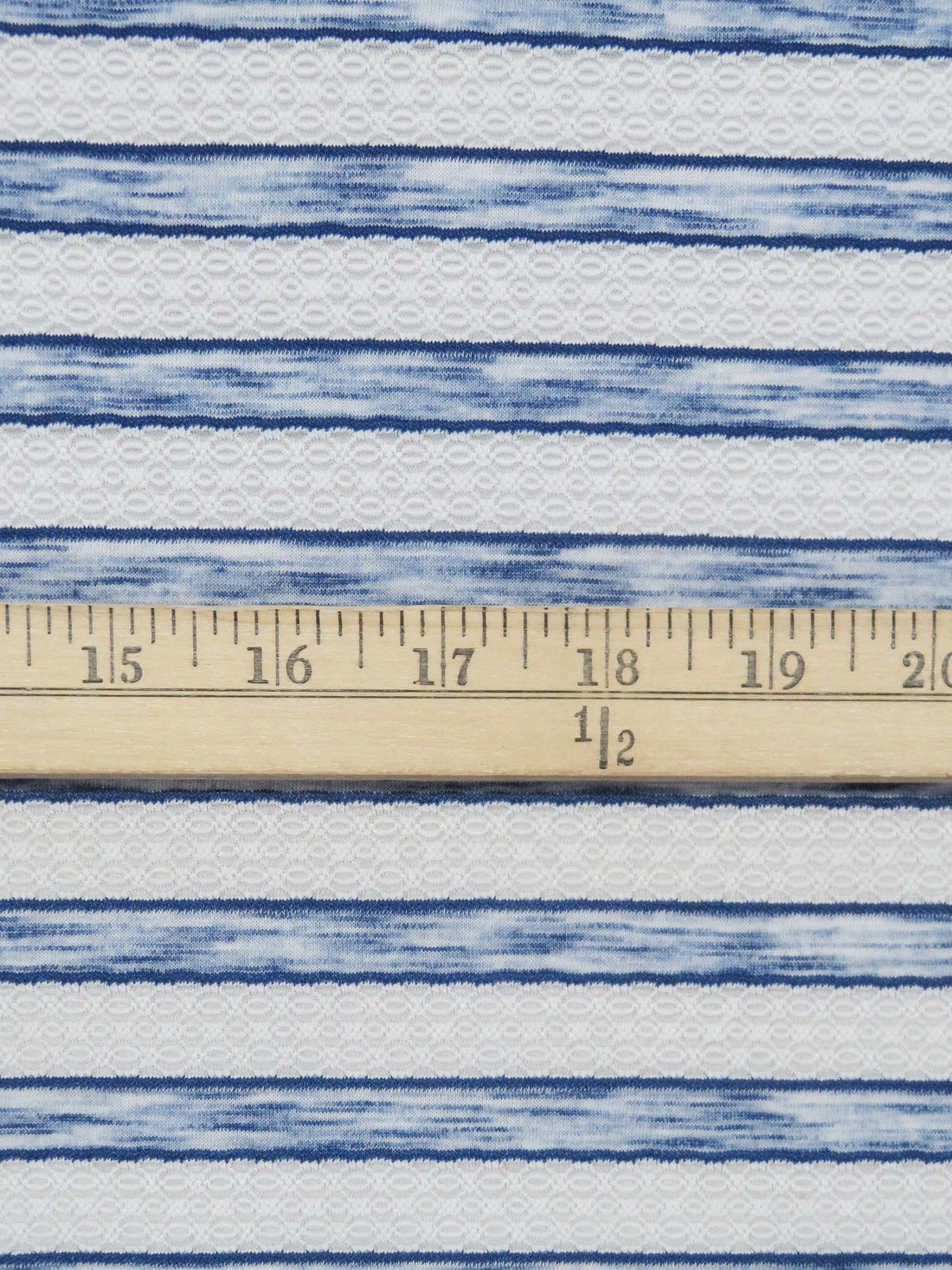White/Heathered Sapphire Polyester/Lycra Horizontal Multi Stripe Novelty Weave Knit 62W