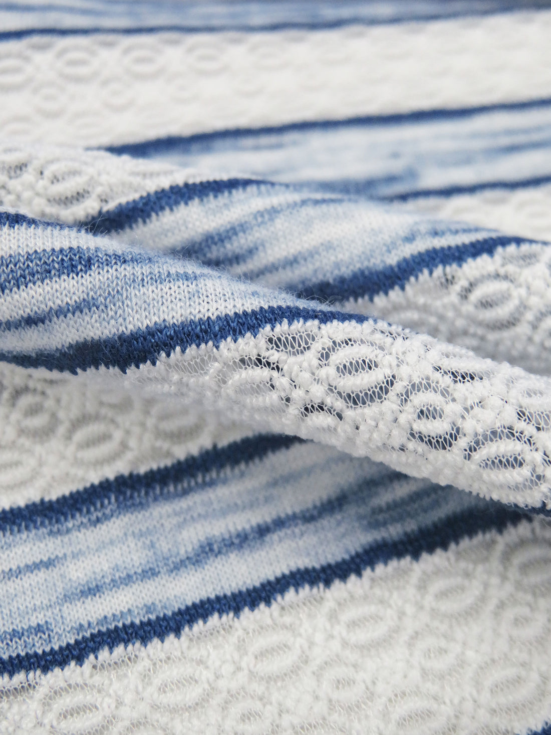 White/Heathered Sapphire Polyester/Lycra Horizontal Multi Stripe Novelty Weave Knit 62W