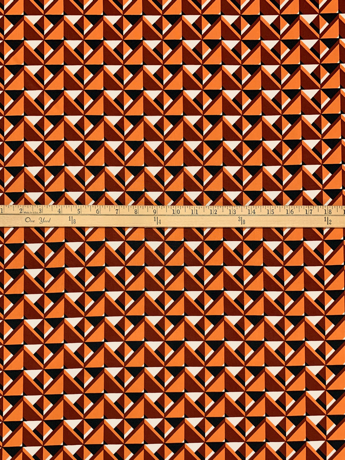 Deep Saffron/Rosewood/Black/White Polyester/Lycra Geometric Print FTY Knit 55W