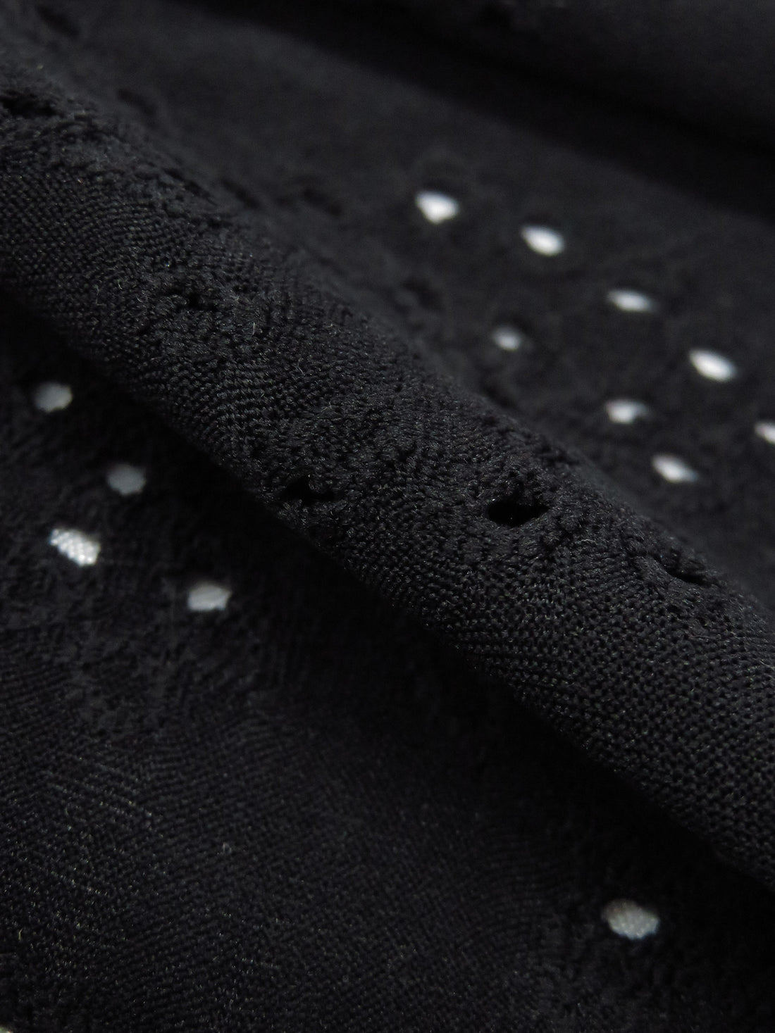 Black Polyester/Lycra Abstract Floral Design Eyelet Knit 56W