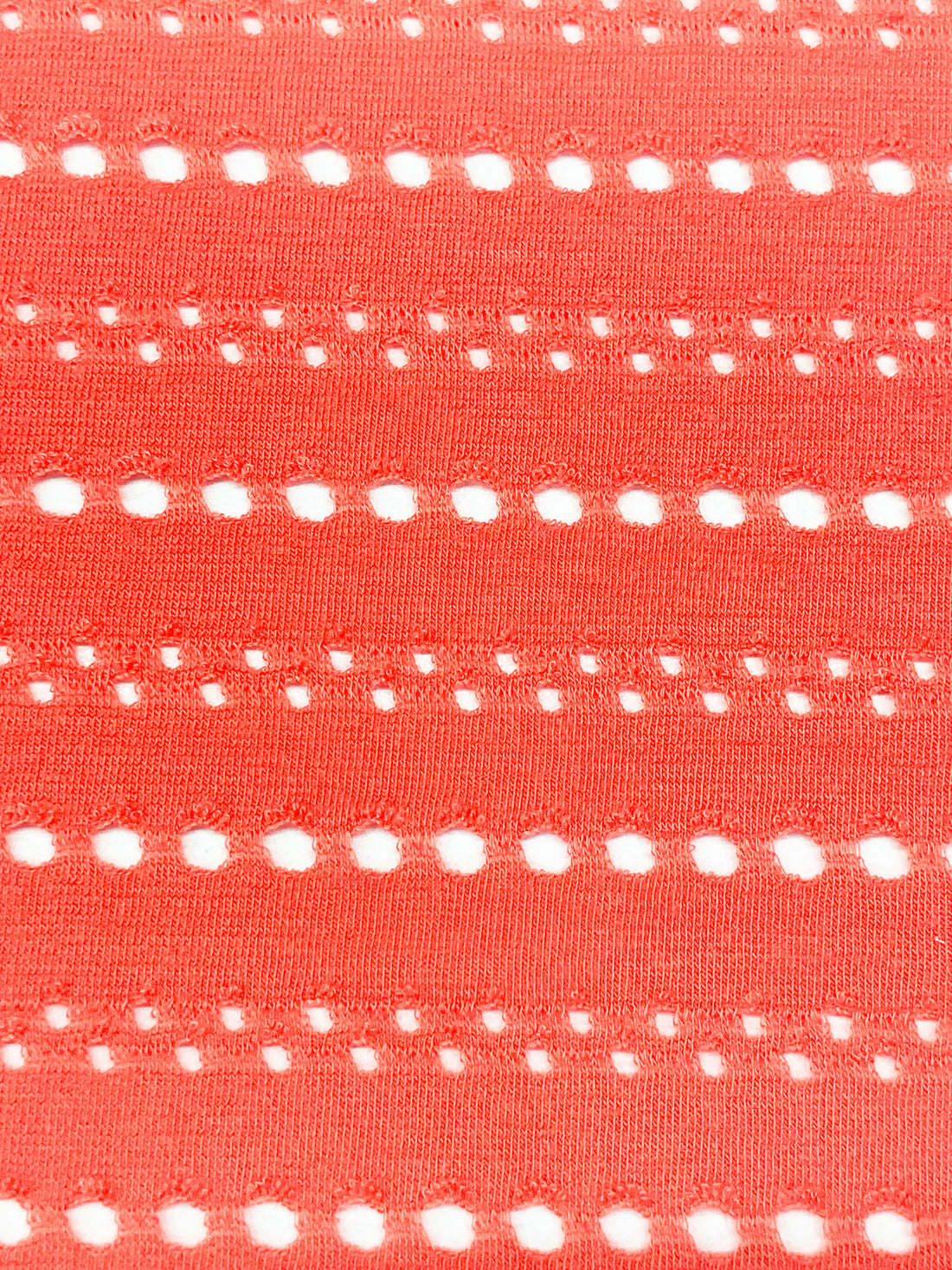 Coral Polyester/Lycra Horizontal Eyelet Knit 55W